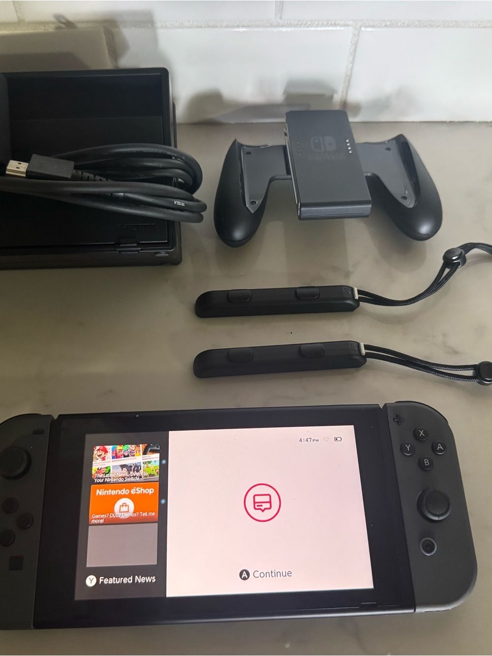 Nintendo Switch Console with Black Joy-Con Controllers and Accessories